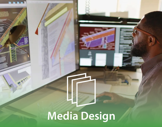 Designer working at multi-monitor media setup