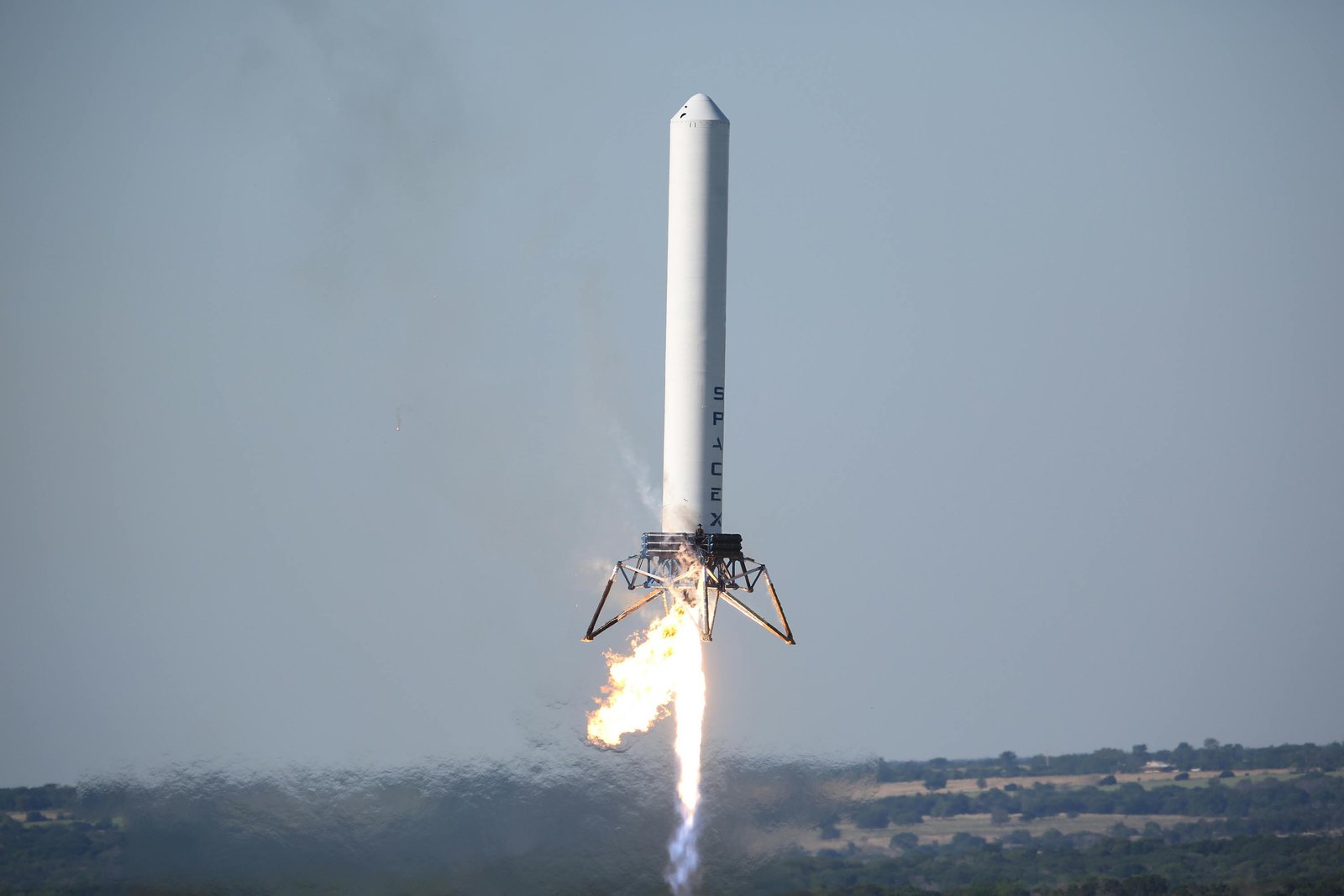 Space rocket booster landing vertically